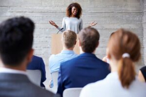 A Google Ads expert witness explaining her expertise to a group of attorneys