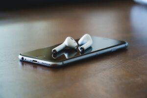 Expert Witness - an iphone and headphones on a desk during a legal case.